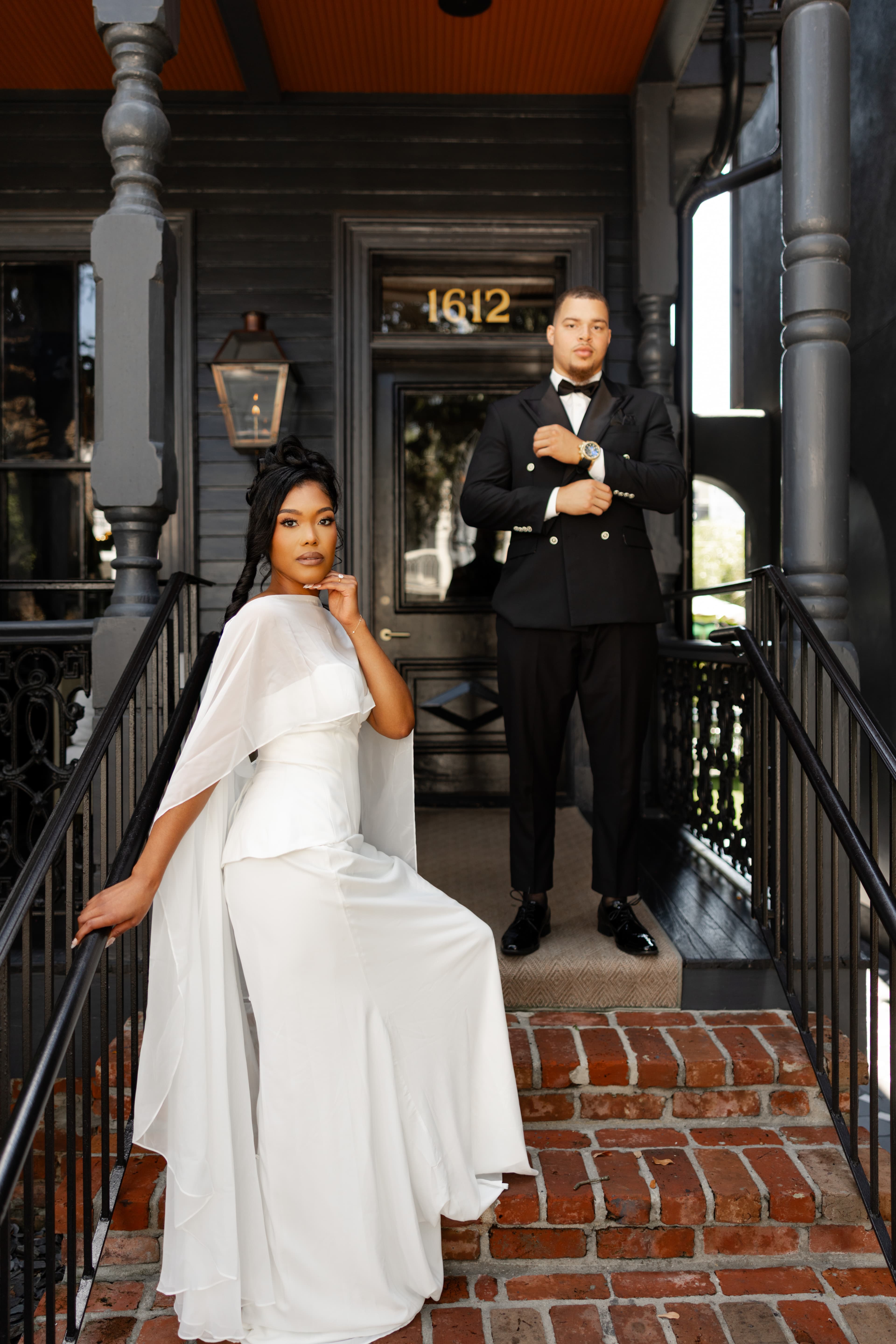 Full-length editorial portrait on a historic New Orleans porch